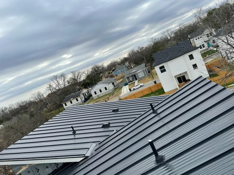 Standing seam metal roof panels with vents for Skylight Repair in North Kansas City
